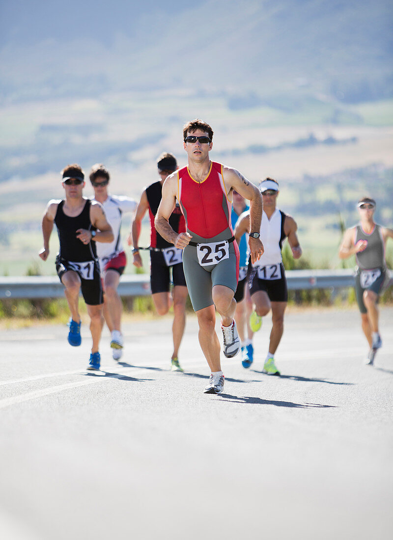 Runners in race on rural road