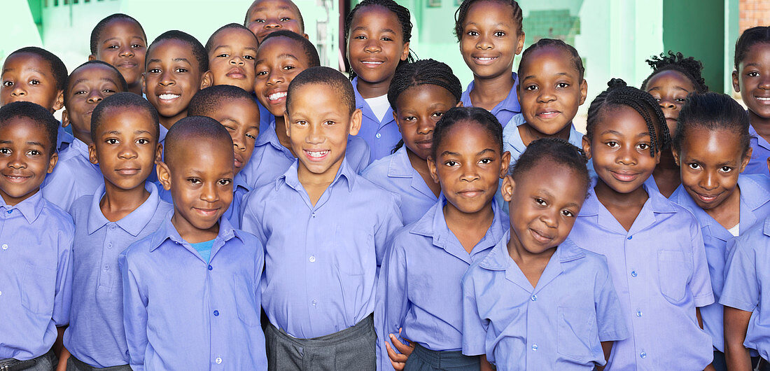 Students smiling together in classroom