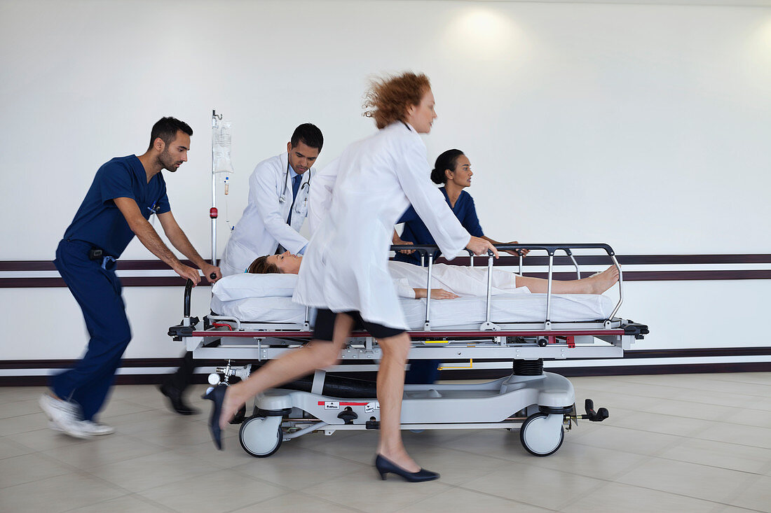 Hospital staff rushing patient