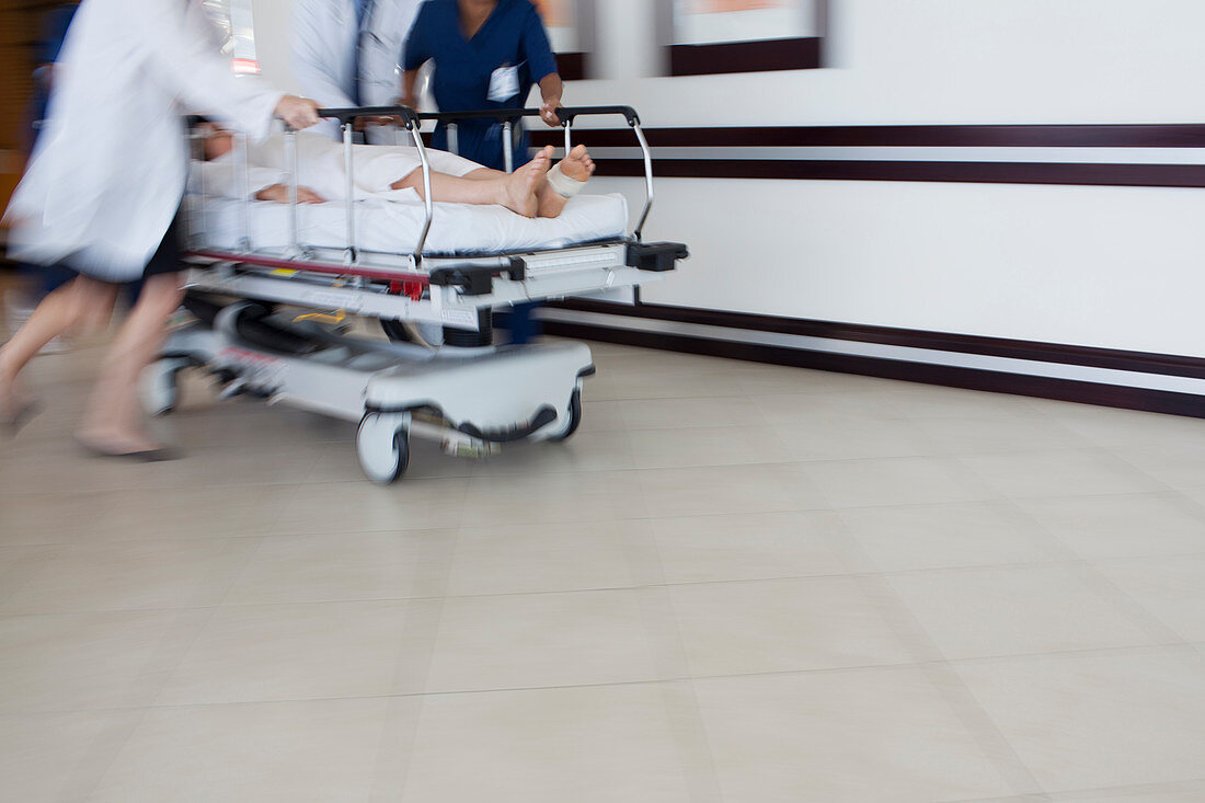 Hospital staff rushing patient