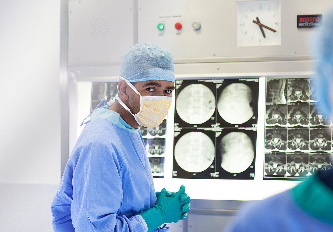 Surgeon examining x-rays