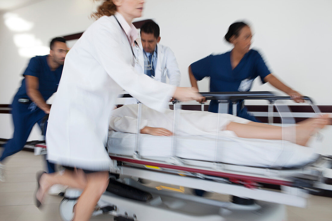 Hospital staff rushing patient