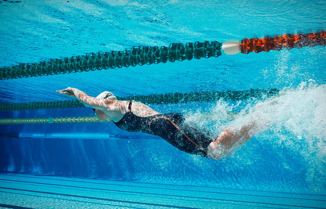 Swimmer racing underwater