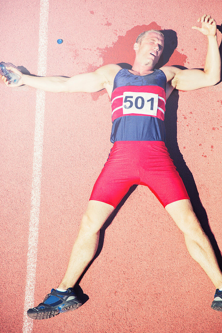 Runner laying on track