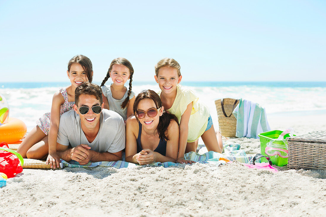 Portrait of smiling family on beach
