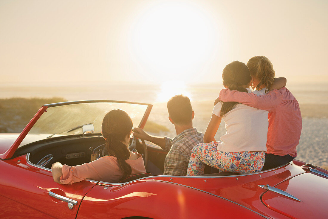 Family watching sunset