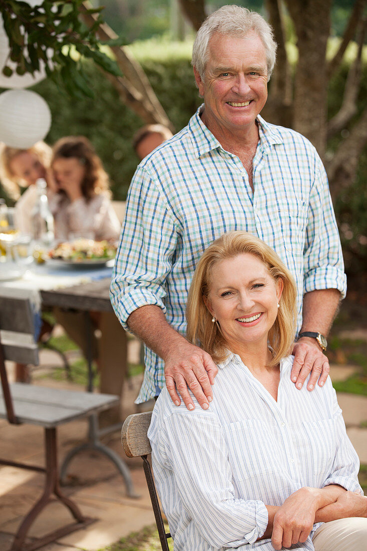 Senior couple smiling outdoors