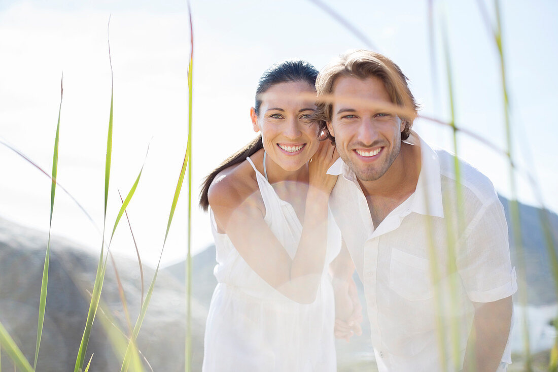 Couple smiling together outdoors