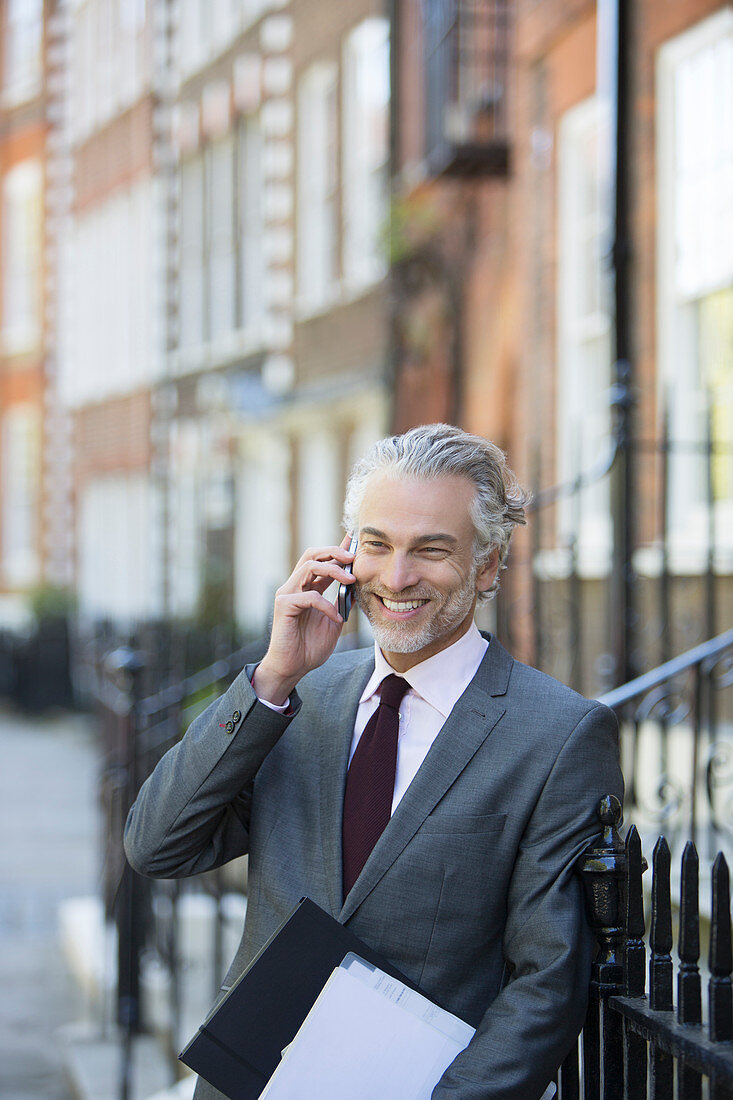 Businessman talking on cell phone