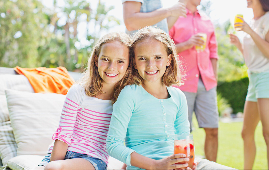 Girls smiling together outdoors