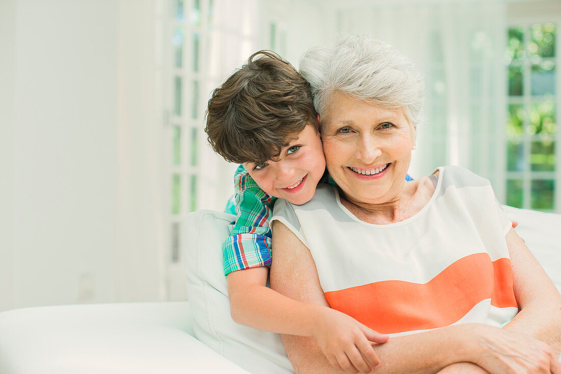 Older woman and grandson smiling