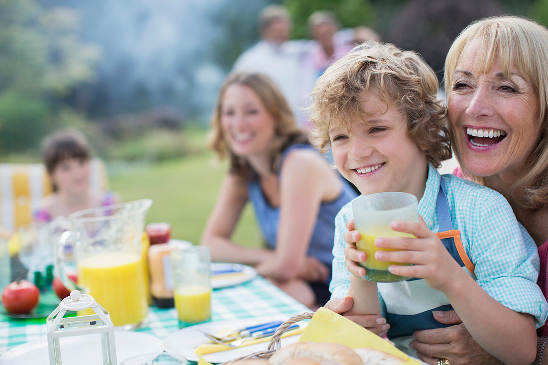 Family eating together outdoors