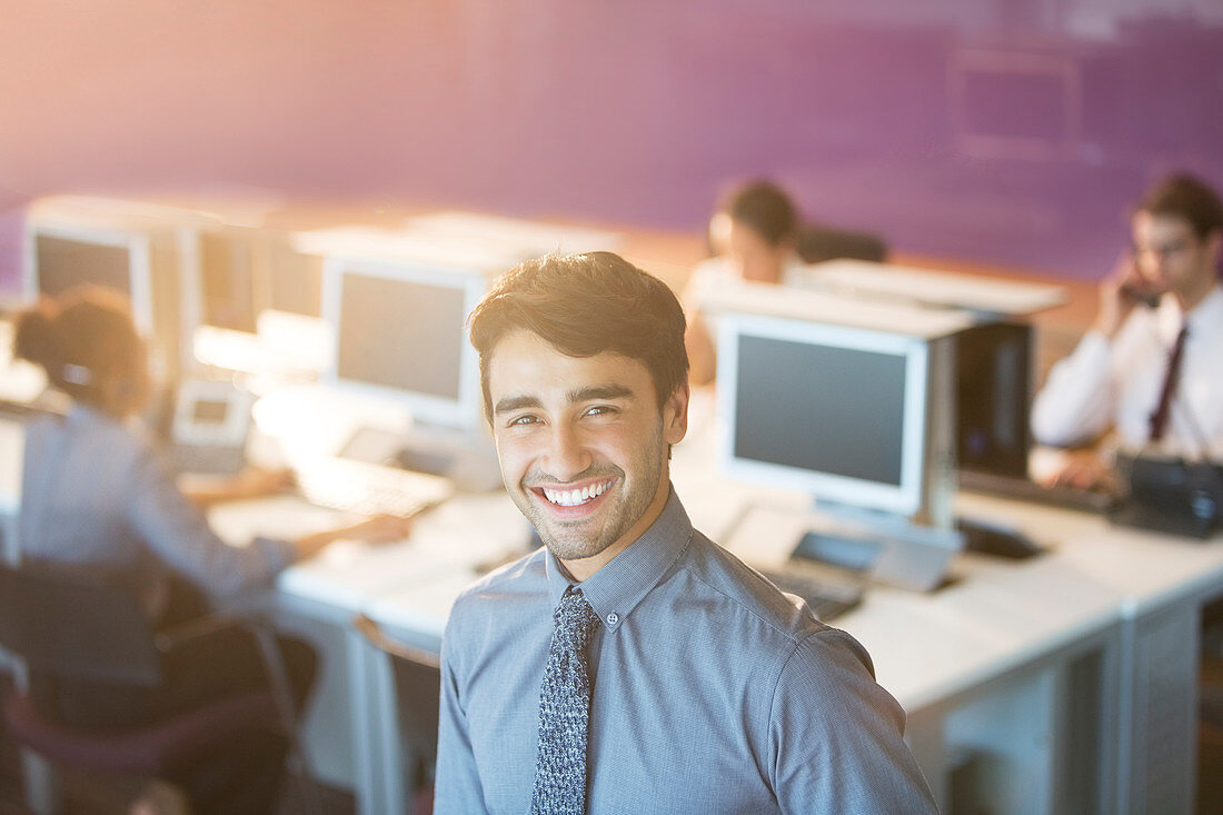 Businessman smiling in office