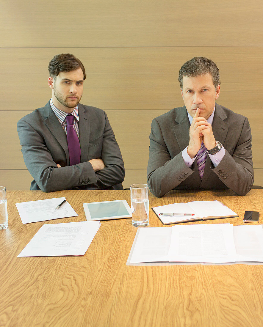 Businessmen sitting in meeting