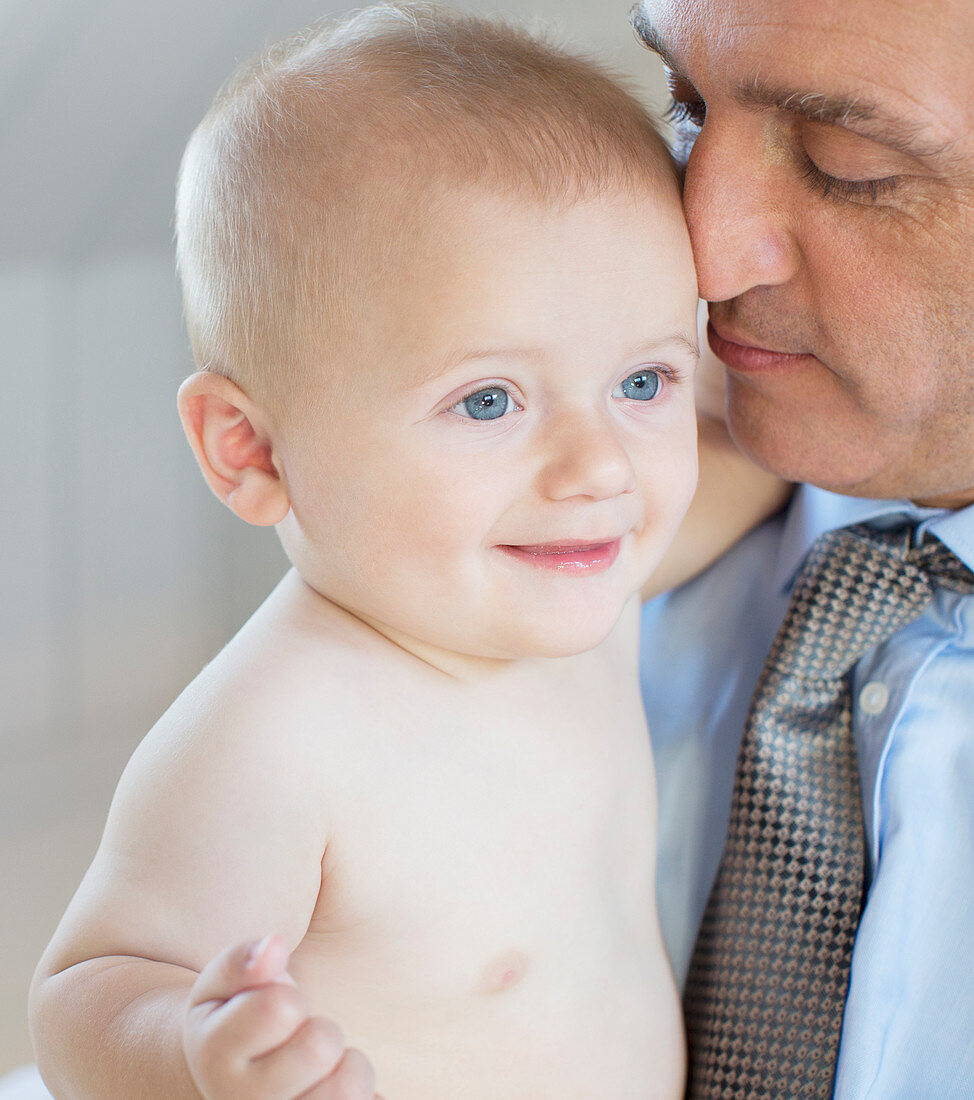 Father holding baby