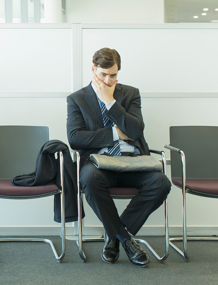 Businessman sitting in waiting area