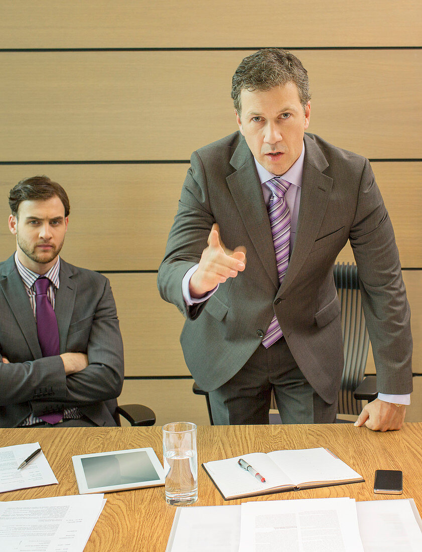 Businessman shaking his finger in meeting