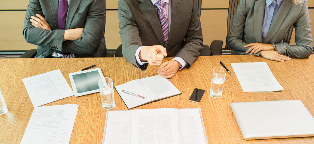 Businessman shaking his finger in meeting