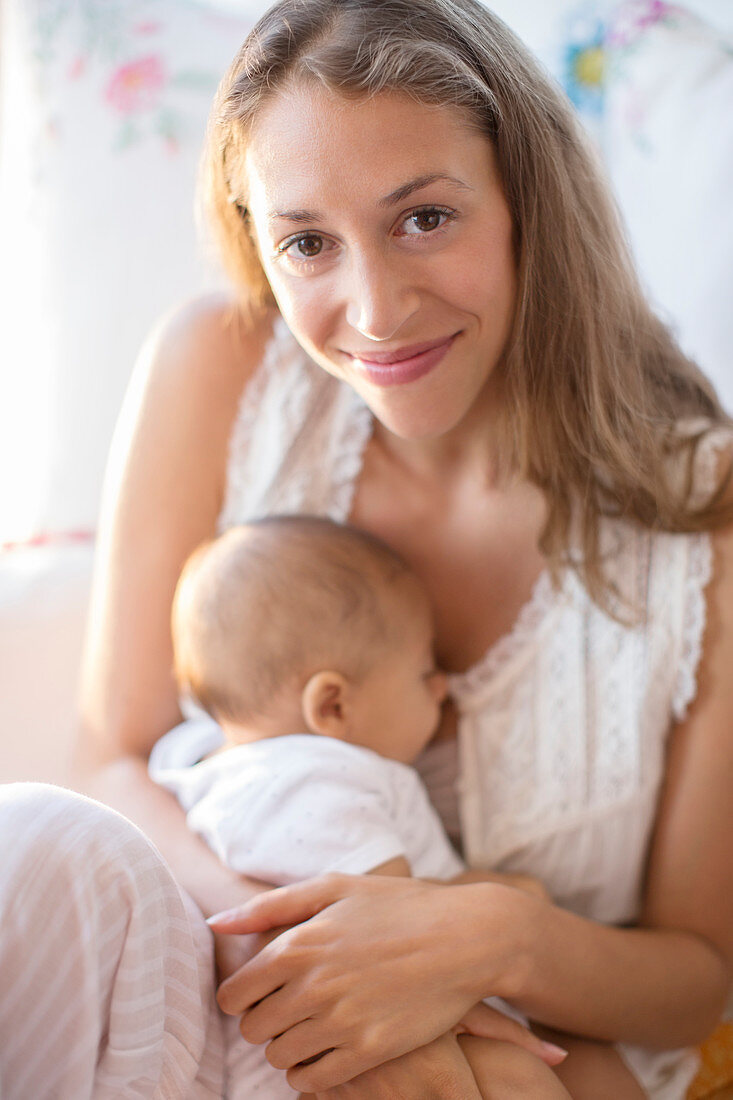 Mother holding baby boy