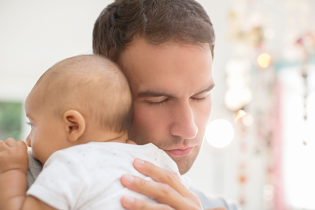 Father holding baby boy