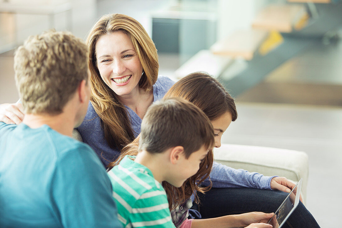 Family relaxing together in living room