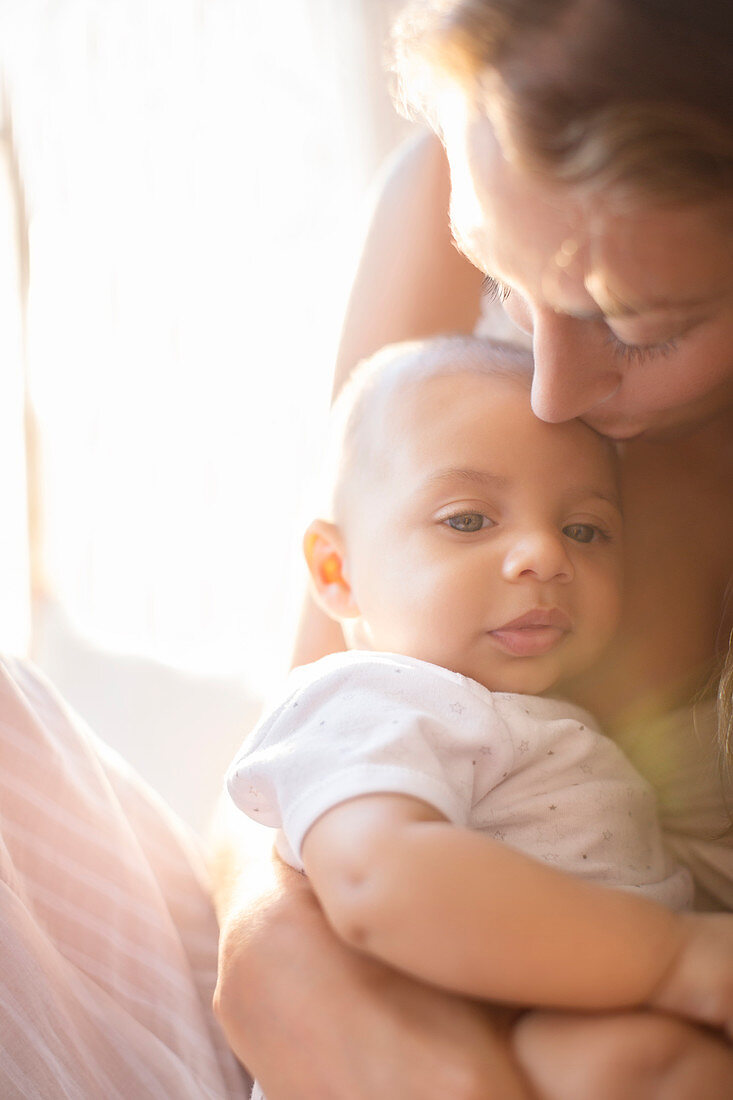 Mother holding baby boy