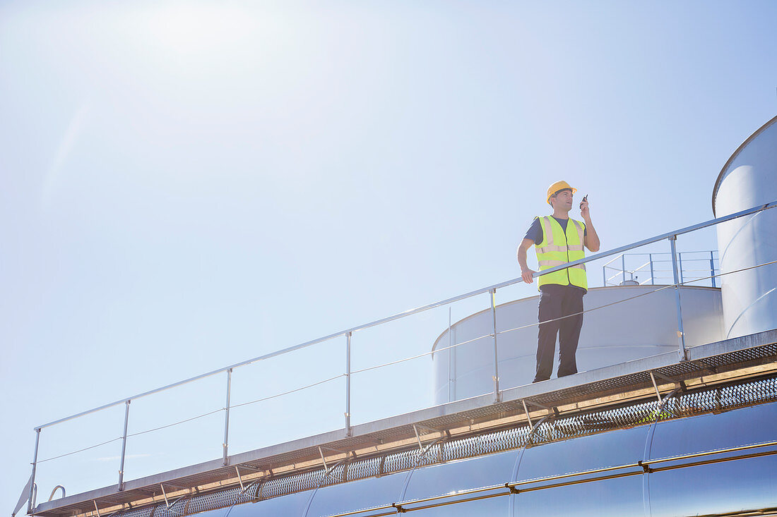 Worker using walkie-talkie