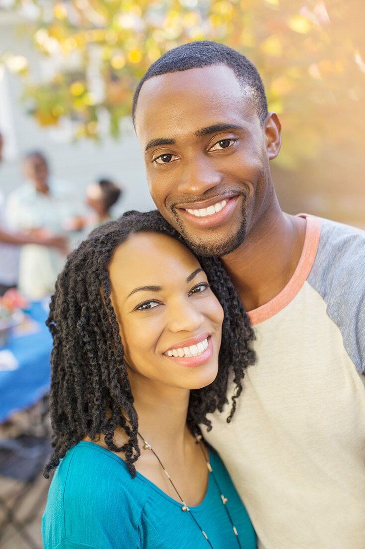 Close up portrait of smiling couple