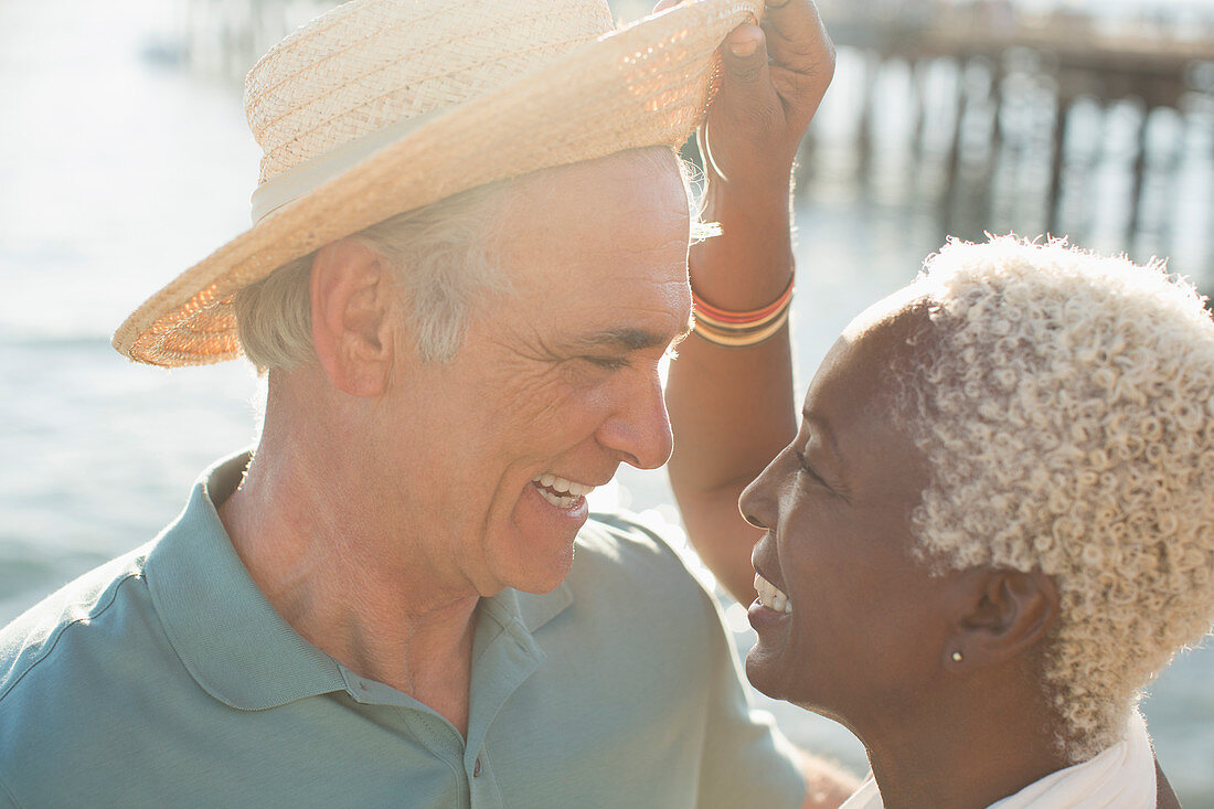 Senior couple on sunny beach