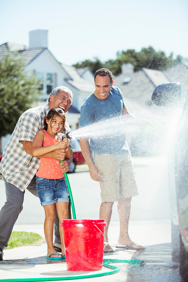 Family washing car