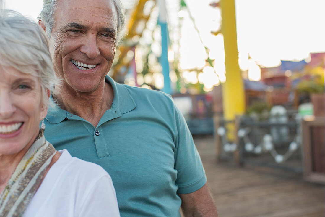 Senior couple at amusement park