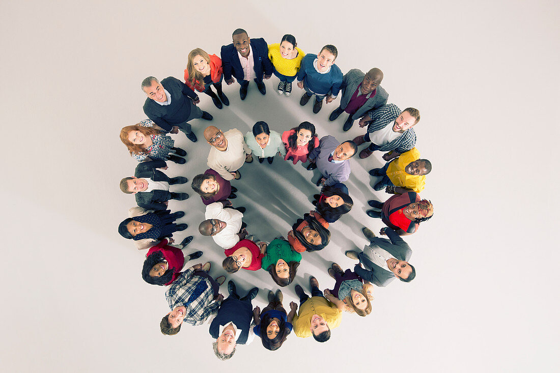 Portrait of diverse crowd in huddle