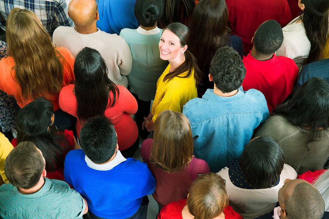 Businesswoman in crowd