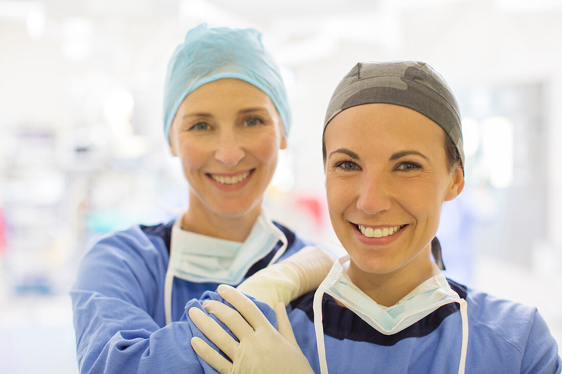 Portrait of two smiling female doctors