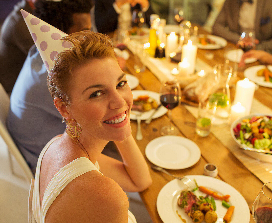 Woman smiling at birthday party