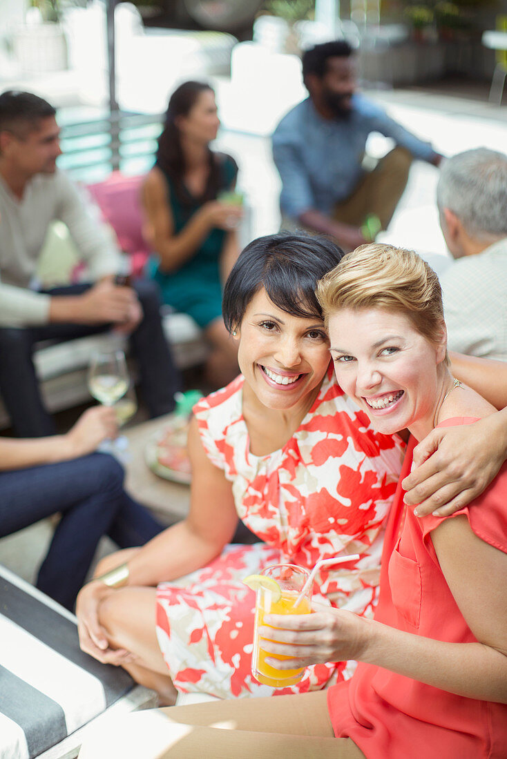 Women hugging at party