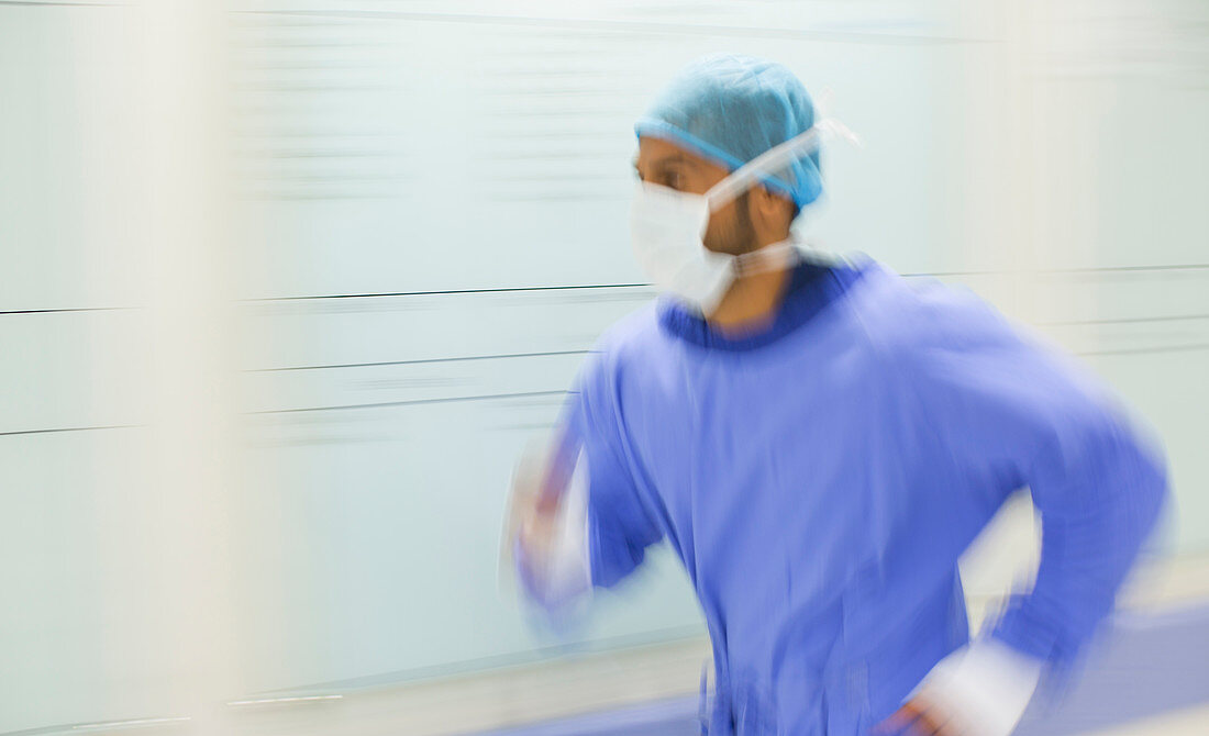 Male surgeon rushing
