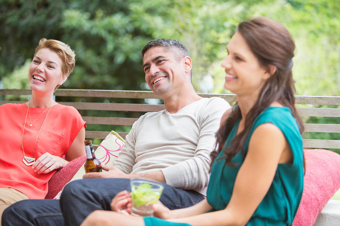 Friends relaxing together outdoors