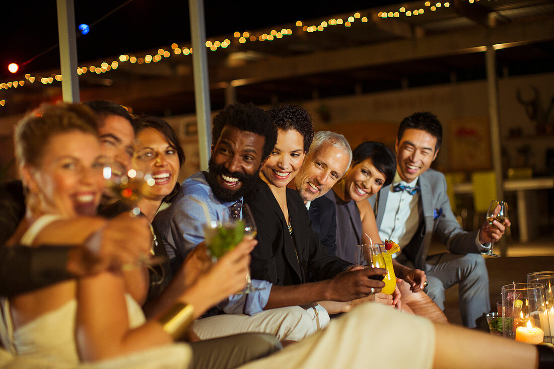 Friends smiling together at party