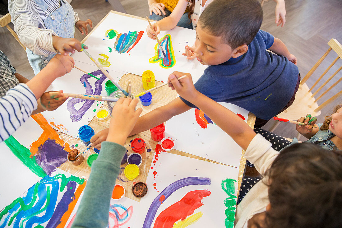 Children painting in class