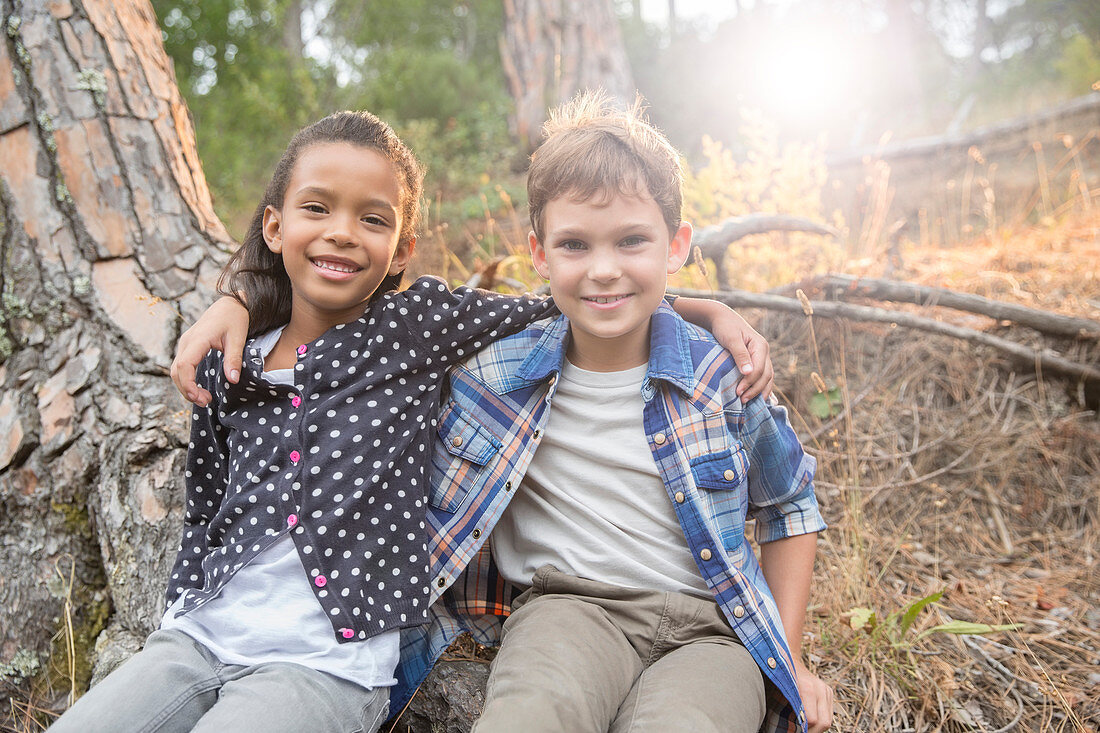 Children sitting together outdoors