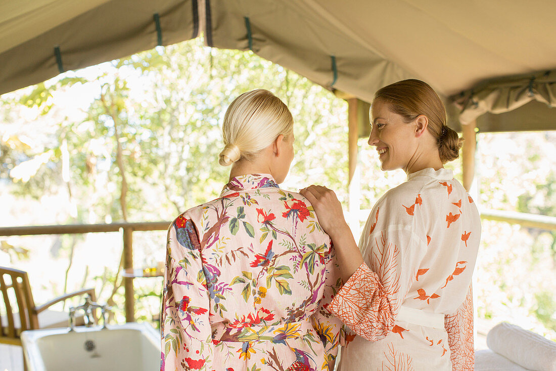 Women wearing bathrobes in spa