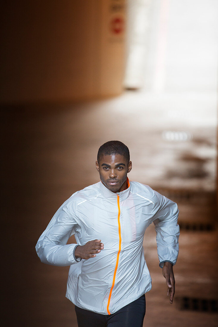 Man running through city streets