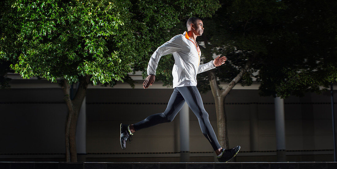 Man running through city streets