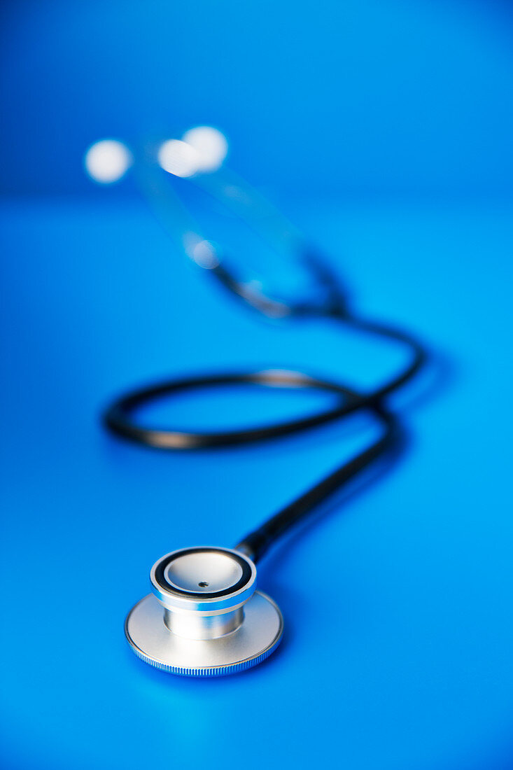 Close up of stethoscope on blue counter