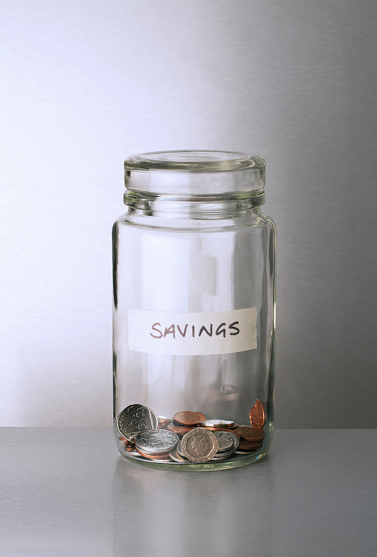 Savings change jar on counter