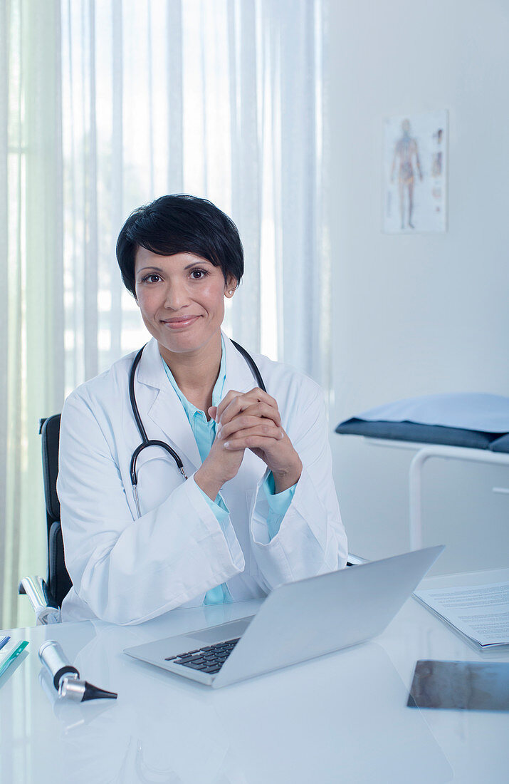 Portrait of smiling female doctor