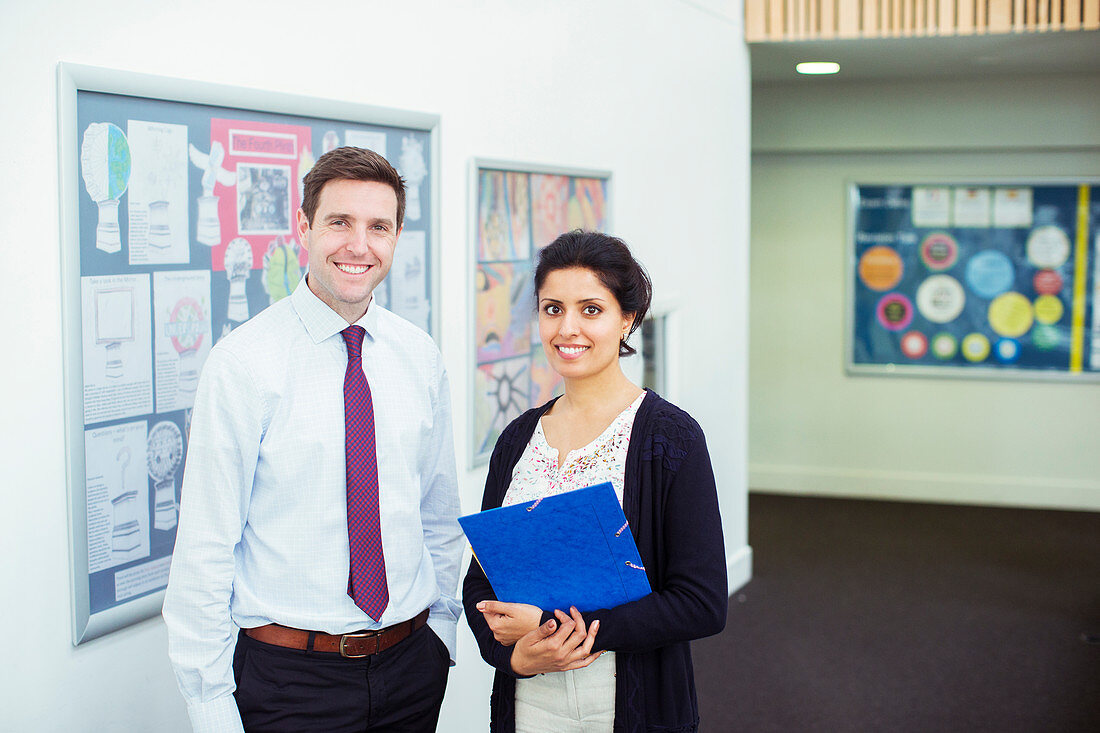 Portrait of tow smiling teachers standing