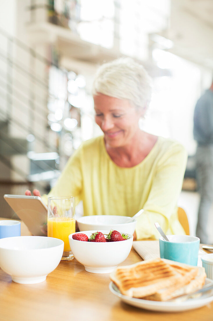 Older woman at breakfast table