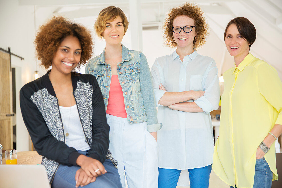 Group of smiling women at work